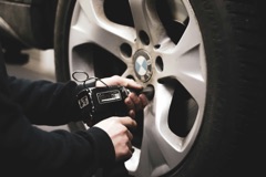 A tire pressure gauge on a valve