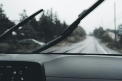 A wiper blade on wet glass