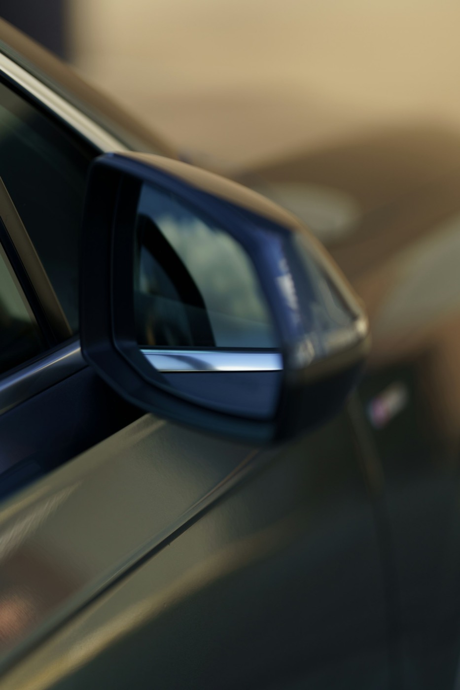 A car side mirror seen from the driver’s seat
