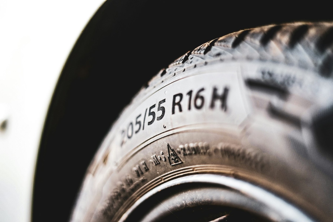 The size markings on the sidewall of a car tire